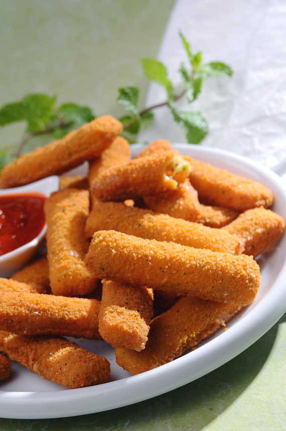 Breaded fried cheese fingers with mint & Ketchup
